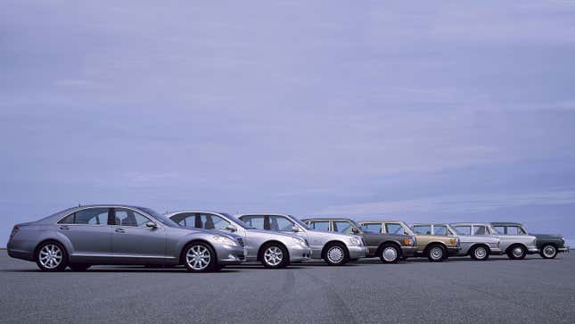 A photo of eight Mercedes S Class sedans lined up in a row. 