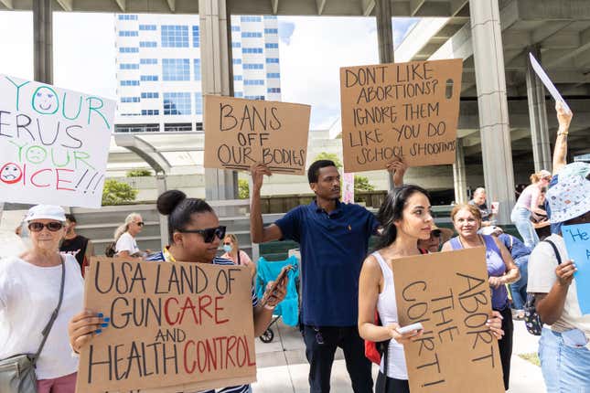 FORT LAUDERDALE, FLORIDA - JULY 13: An abortion rights activist holds a sign at a protest in support of abortion access, 