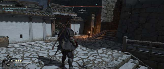 Yasuke stands in the middle of a Japanese castle.