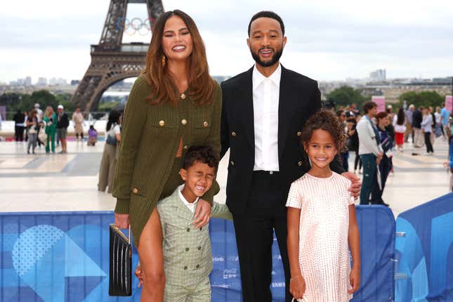 PARIS, FRANCE - JULY 26: Chrissy Teigen and John Legend attend with son Miles and daughter Luna the red carpet ahead of the opening ceremony of the Olympic Games Paris 2024 on July 26, 2024 in Paris, France. 