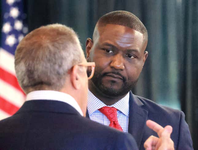 FILE - Central Florida Tourism Oversight District board administrator Glen Gilzean listens to chairman Martin Garcia, left, during the board&#39;s meeting in the headquarters of the former Reedy Creek Improvement District at Walt Disney World in Lake Buena Vista, Fla., Aug. 23, 2023. Less than a year after being picked to lead Walt Disney World&#39;s government after it was taken over by Gov. Ron DeSantis&#39; allies, the district&#39;s administrator was appointed by the Florida governor on Monday, March 4, 2024 to run elections in the county that is home to the Disney theme park resort and other theme parks. Gilzean was appointed by DeSantis to be supervisor of elections in Orange County, Florida&#39;s fifth largest county. (Joe Burbank/Orlando Sentinel via AP, File)