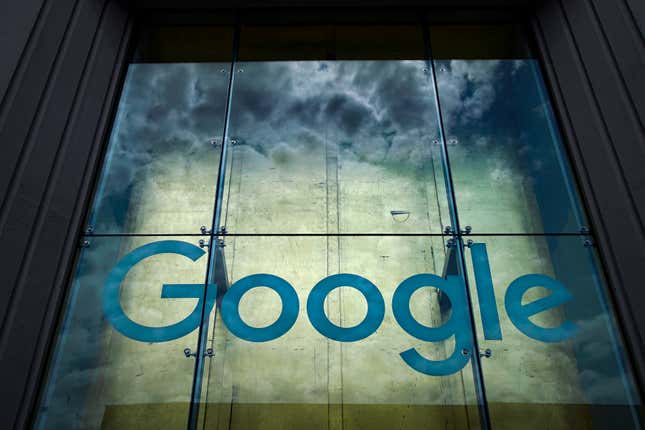 Clouds form in the reflection of a Google office building in New York