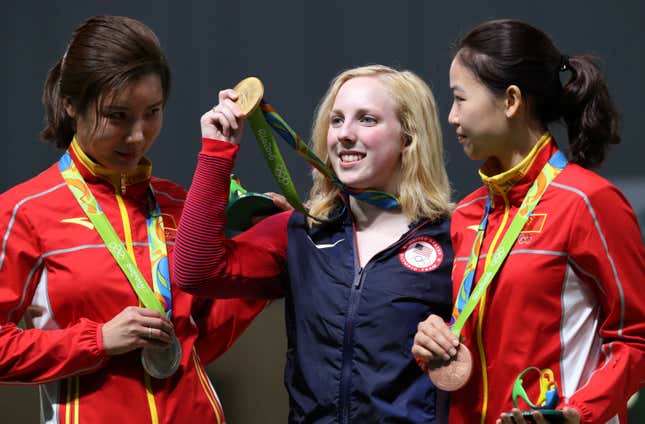 Virginia Thrasher, center, of the United States holds her gold medal for the Women's 10m Air Rifle competition during the award ceremony with the runner-up Du li, left, of China and third place Yi Siling, right, of China at Olympic Shooting Center at the 2016 Summer Olympics in Rio de Janeiro, Brazil, Saturday, Aug. 6, 2016. ()