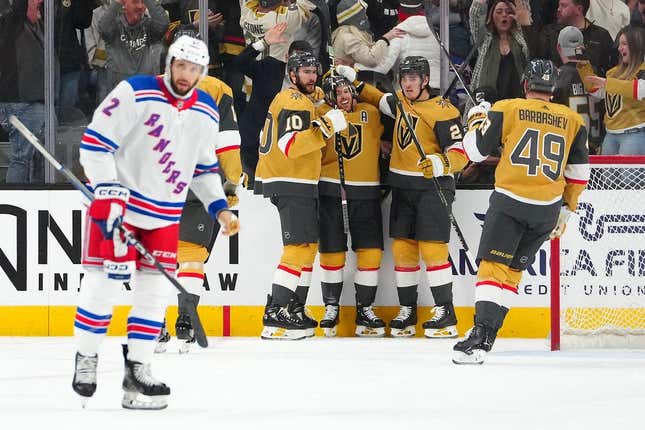 Jan 18, 2024; Las Vegas, Nevada, USA; Vegas Golden Knights right wing Jonathan Marchessault (81) celebrates with team mates after scoring a goal against the New York Rangers during the first period at T-Mobile Arena.