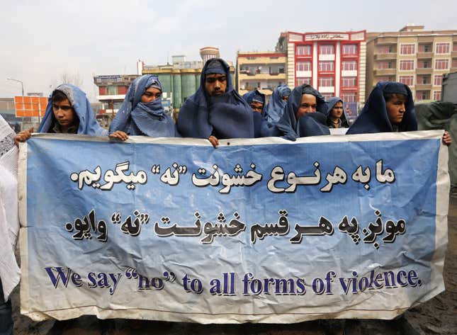 Image for article titled These awesome Afghan guys wore burqas for women’s rights