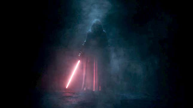 A Force user wields  a red lightsaber with their body cloaked in darkness.