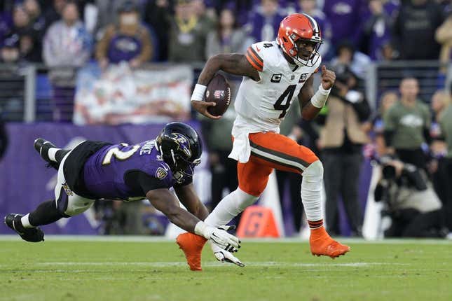 Nov 12, 2023; Baltimore, Maryland, USA; Cleveland Browns quarterback Deshaun Watson (4) runs with the ball as Baltimore Ravens defensive tackle Justin Madubuike (92) defends during the second half at M&amp;amp;T Bank Stadium.