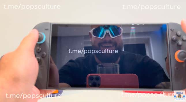 A man looks at a Switch 2 screen.