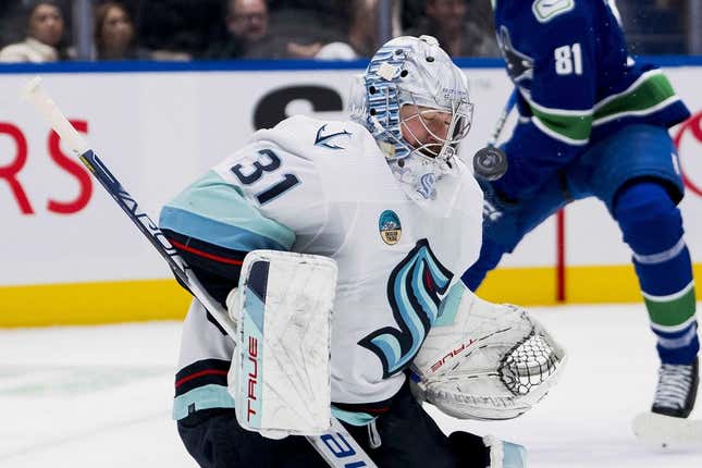 Nov 18, 2023; Vancouver, British Columbia, CAN; Seattle Kraken goalie Philipp Grubauer (31) makes a save against the Seattle Kraken in the first period at Rogers Arena.