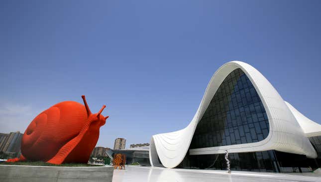 An exterior view of Hadid’s Heydar Aliyev Center in downtown of Baku, Azerbaijan. EPA/Robert Ghement.