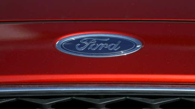The Ford logo is displayed on a brand new Ford Focus car at Serramonte Ford on October 25, 2018 in Colma, California.