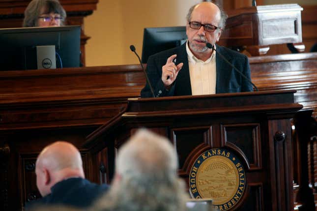 Kansas state Rep. Tom Sawyer, D-Wichita, speaks against a Republican for cutting taxes, Thursday, Jan. 18, 2024, at the Statehouse in Topeka, Kan. Sawyer opposes the measure because it moves Kansas to a single personal income tax rate from three rates and he says that benefits the wealthy and does nothing for the middle class. (AP Photo/John Hanna)