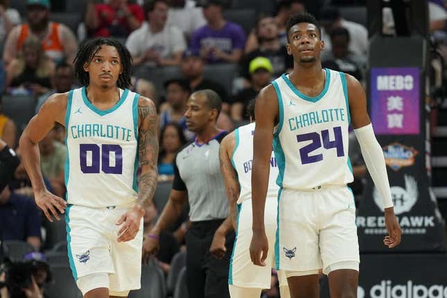 Jul 3, 2023; Sacramento, CA, USA; Charlotte Hornets guard Nick Smith Jr. (00) and forward Brandon Miller (24) walk on the court during the third quarter at Golden 1 Center.