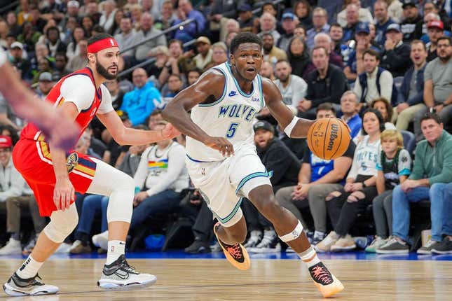 Nov 8, 2023; Minneapolis, Minnesota, USA; Minnesota Timberwolves guard Anthony Edwards (5) dribbles against the New Orleans Pelicans in the second quarter at Target Center.