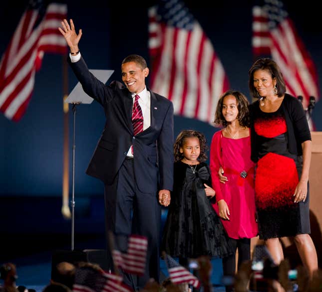 President elect Barack Obama, his daughter Sasha, 7, (in black), his daughter Maila, 10 (in pink) and his wife Michele on the stage of his election night victory party in Chicago’s Grant Park.