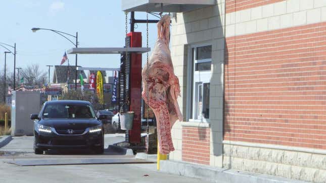 Image for article titled Fast Food Drive-Thru Just Cow Carcass, Bucket For Money