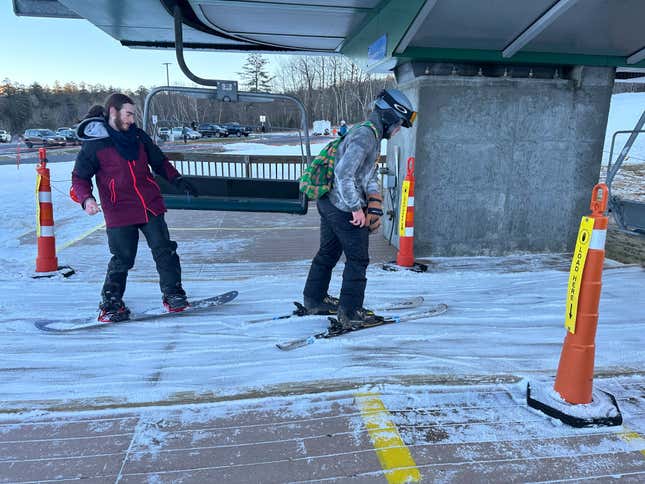 Skiers and snowboarders get on a chairlift at Gunstock Mountain Resort on Thursday, Dec. 21, 2023, in in Gilford, N.H. For most Americans dreaming of a white Christmas, this year&#39;s prospects aren&#39;t good. Although parts of the Rockies and Midwest already have snow or could get a fresh dusting by Monday, other parts of the country that are normally coated in white this time of year are still sporting their drab late-fall look. (AP Photo/Nick Perry)