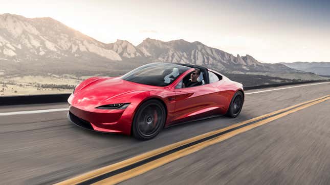 a render of a red Tesla Roadster sports car with its roof down. 