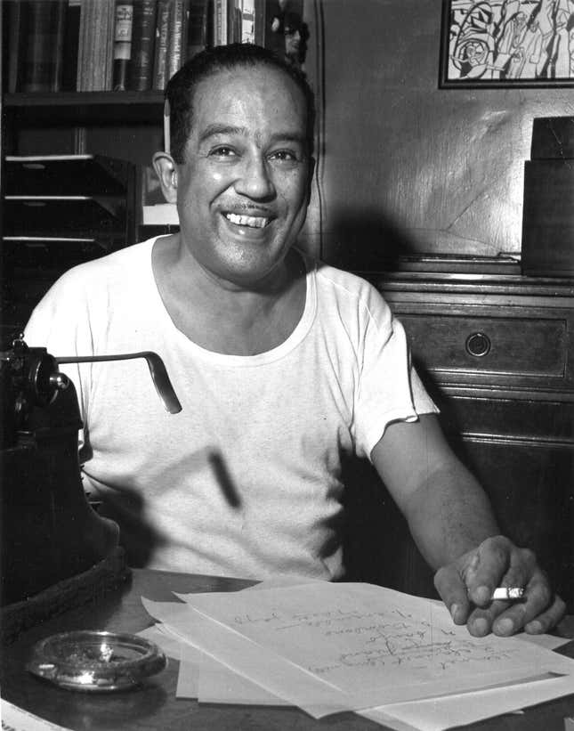 Portrait of American author Langston Hughes (1902 - 1967) as he sits at a desk, 1954. (Photo by Fred Stein Archive/Archive Photos/Getty Images)