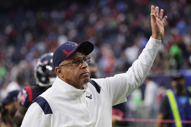 Head coach David Culley of the Houston Texans waves to fans as he walks off the field after defeating the Los Angeles Chargers 41-29 at NRG Stadium on December 26, 2021 in Houston, Texas. 