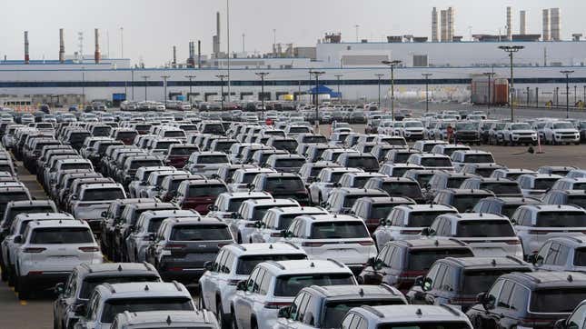 New vehicles are shown parked in storage lots near the the Stellantis Detroit Assembly Complex in Detroit, Wednesday, Oct. 5, 2022.