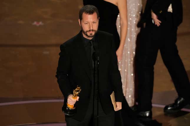 Mstyslav Chernov accepts the award for best documentary feature film for &quot;20 Days in Mariupol&quot; during the Oscars on Sunday, March 10, 2024, at the Dolby Theatre in Los Angeles. (AP Photo/Chris Pizzello)