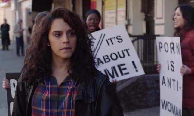 Loretta (Sepideh Moafi) at a Women Against Pornography protest.