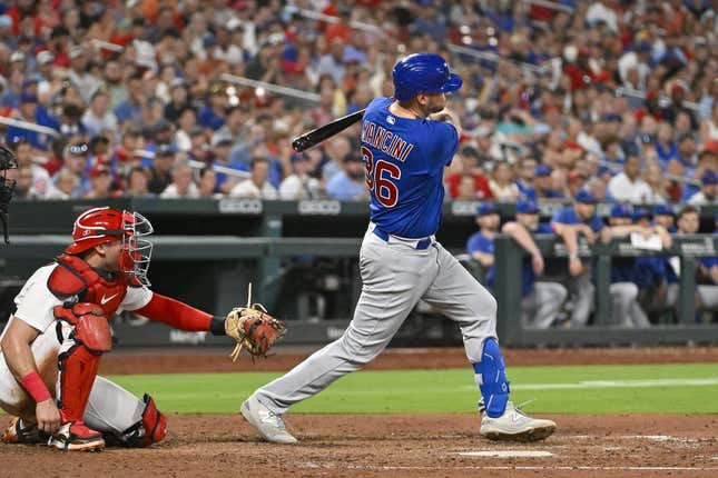 Jul 28, 2023; St. Louis, Missouri, USA; Chicago Cubs first baseman Trey Mancini (36) hits a one run single against the St. Louis Cardinals during the sixth inning at Busch Stadium.