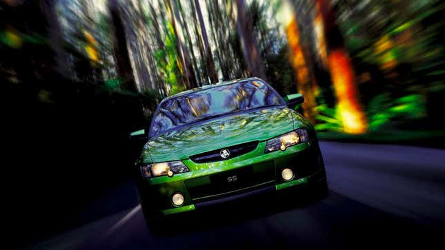 A green Holden Commodore Sedan