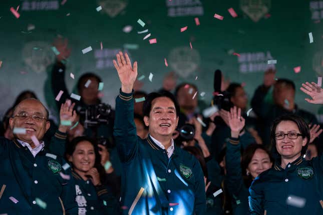 Taiwanese Vice President Lai Ching-te, also known as William Lai, left, celebrates his victory with running mate Bi-khim Hsiao in Taipei, Taiwan, Saturday, Jan. 13, 2024. The Ruling-party candidate has emerged victorious in Taiwan&#39;s presidential election and his opponents have conceded. (AP Photo/Louise Delmotte)