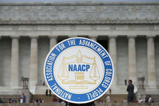 A logo is seen for the National Association for the Advancement of Colored People as NAACP President and CEO Cornell William Brooks speaks during a press conference at the Lincoln Memorial on June 15, 2015, in Washington, DC. Brooks announced “America’s Journey for Justice,” an 860-mile march from Selma, Alabama, to Washington, D.C., and a campaign “to protect the right of every American to a fair criminal justice system.