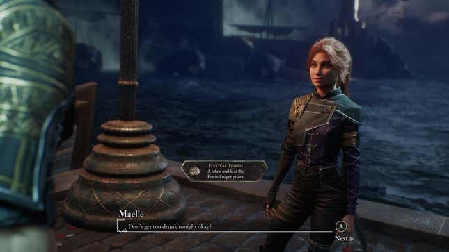 Maelle gives Gustave a token.