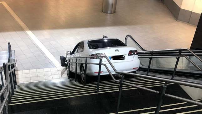 Image for article titled Car Thief Drives Mazda6 Down Bus Station Staircase in Madrid