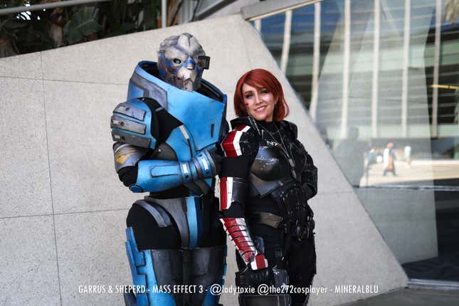 Garrus and Shepard stand in a prom pose.