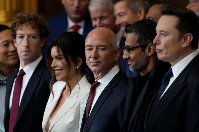 Mark Zuckerberg, Lauren Sanchez, Jeff Bezos, Sundar Pichai, and Elon Musk standing beside each other in a row