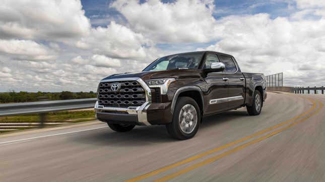 A photo of a brown Toyota Tundra pickup truck. 