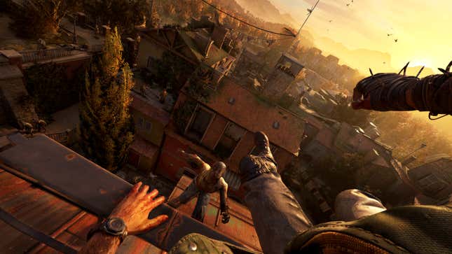 A first-person view of clambering on a rooftop in a city at sunset (or sunrise) while a zombie appears to be in pursuit.