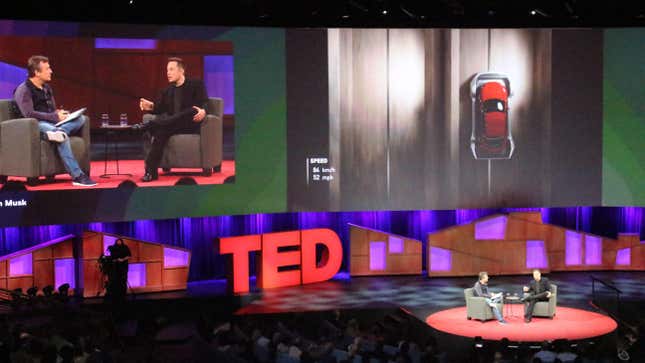 Tech entrepreneur Elon Musk (R) discusses a vision of cars being lowered into tunnels to travel efficiently and eliminate traffic congestion with curator Chris Anderson (L) at a TED Conference in Vancouver, Canada, April 28, 2017. 