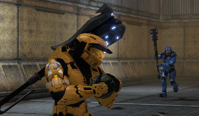 Two Spartans equipped with gravity hammers play Grifball. 