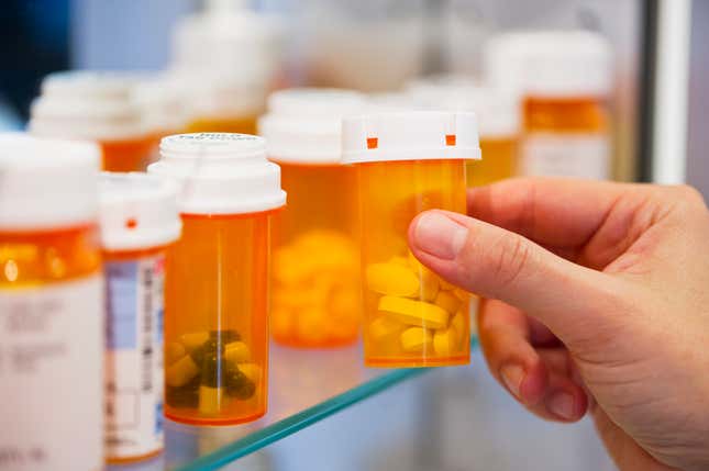 Pill bottles on shelf.