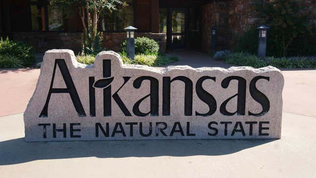 A photo of a stone sign in Arkansas State. 