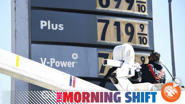 An electrical contractor repairs a sign with gasoline fuel prices above six and seven dollars a gallon at the Shell gas station at Fairfax and Olympic Blvd in Los Angeles, California, on March 8, 2022.