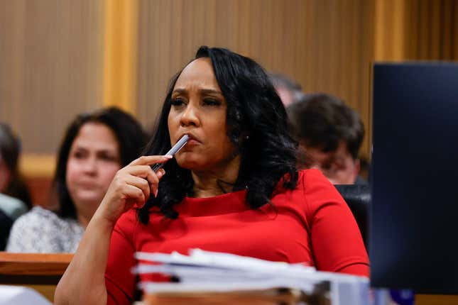 ATLANTA, GA - MARCH 01: Fulton County District Attorney Fani Willis looks on during a hearing in the case of the State of Georgia v. Donald John Trump at the Fulton County Courthouse on March 1, 2024, in Atlanta, Georgia. The hearing is to determine whether Fulton County District Attorney Fani Willis should be removed from the case because of a relationship with Nathan Wade, special prosecutor she hired in the election interference case against former President Donald Trump.