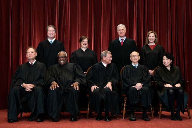 Members of the Supreme Court pose for a group photo at the Supreme Court in Washington, DC on April 23, 2021. Seated from left: Associate Justice Samuel Alito, Associate Justice Clarence Thomas, Chief Justice John Roberts, Associate Justice Stephen Breyer and Associate Justice Sonia Sotomayor, Standing from left: Associate Justice Brett Kavanaugh, Associate Justice Elena Kagan, Associate Justice Neil Gorsuch and Associate Justice Amy Coney Barrett.