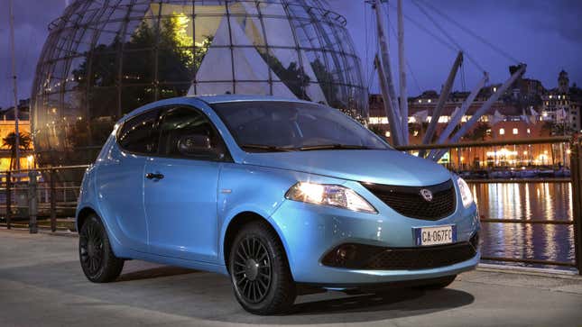 A photo of a blue Lancia Ypsilon hatchback. 