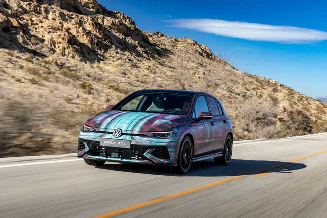 The camouflaged MK8.5 GTI driving in the desert