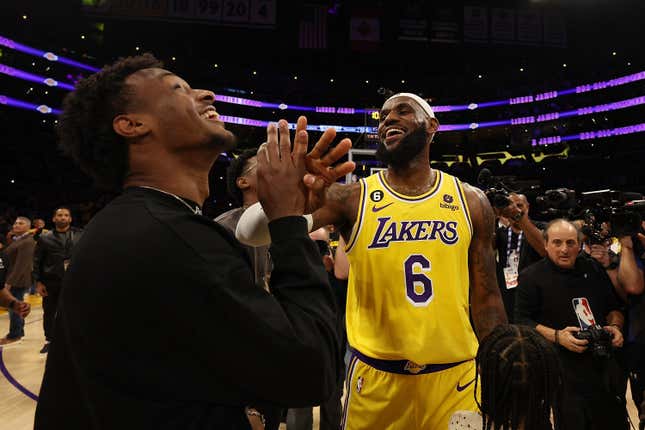 LeBron James #6 of the Los Angeles Lakers reacts with Bronny James after scoring to pass Kareem Abdul-Jabbar to become the NBA’s all-time leading scorer, surpassing Abdul-Jabbar’s career total of 38,387 points against the Oklahoma City Thunder at Crypto.com Arena on February 07, 2023 in Los Angeles, California.
