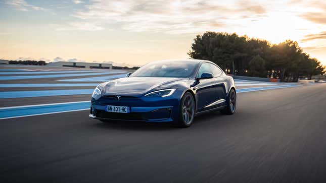 A Tesla Model S Plaid going down a straight at Circuit Paul Ricard