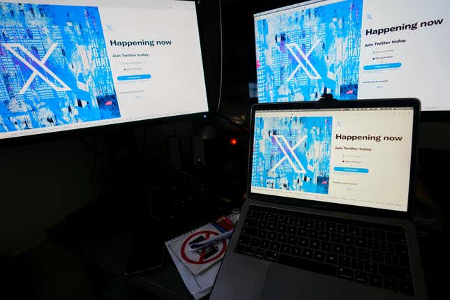 FILE - Computer monitors and a laptop display the X, formerly known as Twitter, sign-in page, July 24, 2023, in Belgrade, Serbia. Former senior executives of Twitter filed suit against Elon Musk and X Corp. on Monday, March 4, saying they are entitled to more than $128 million total in unpaid severance payments. (AP Photo/Darko Vojinovic, File)