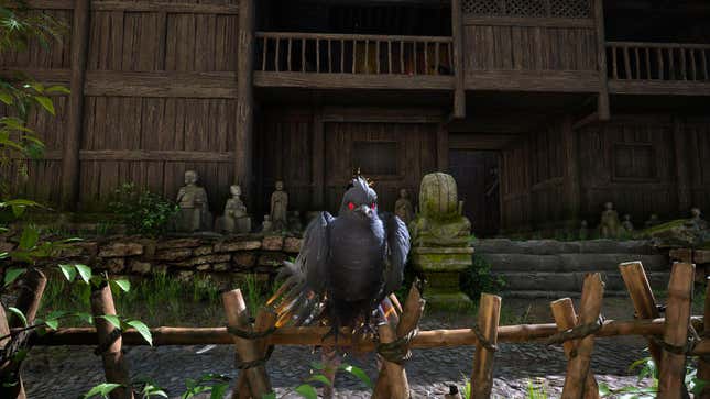 A bird with glowing red eyes perches on a fence.